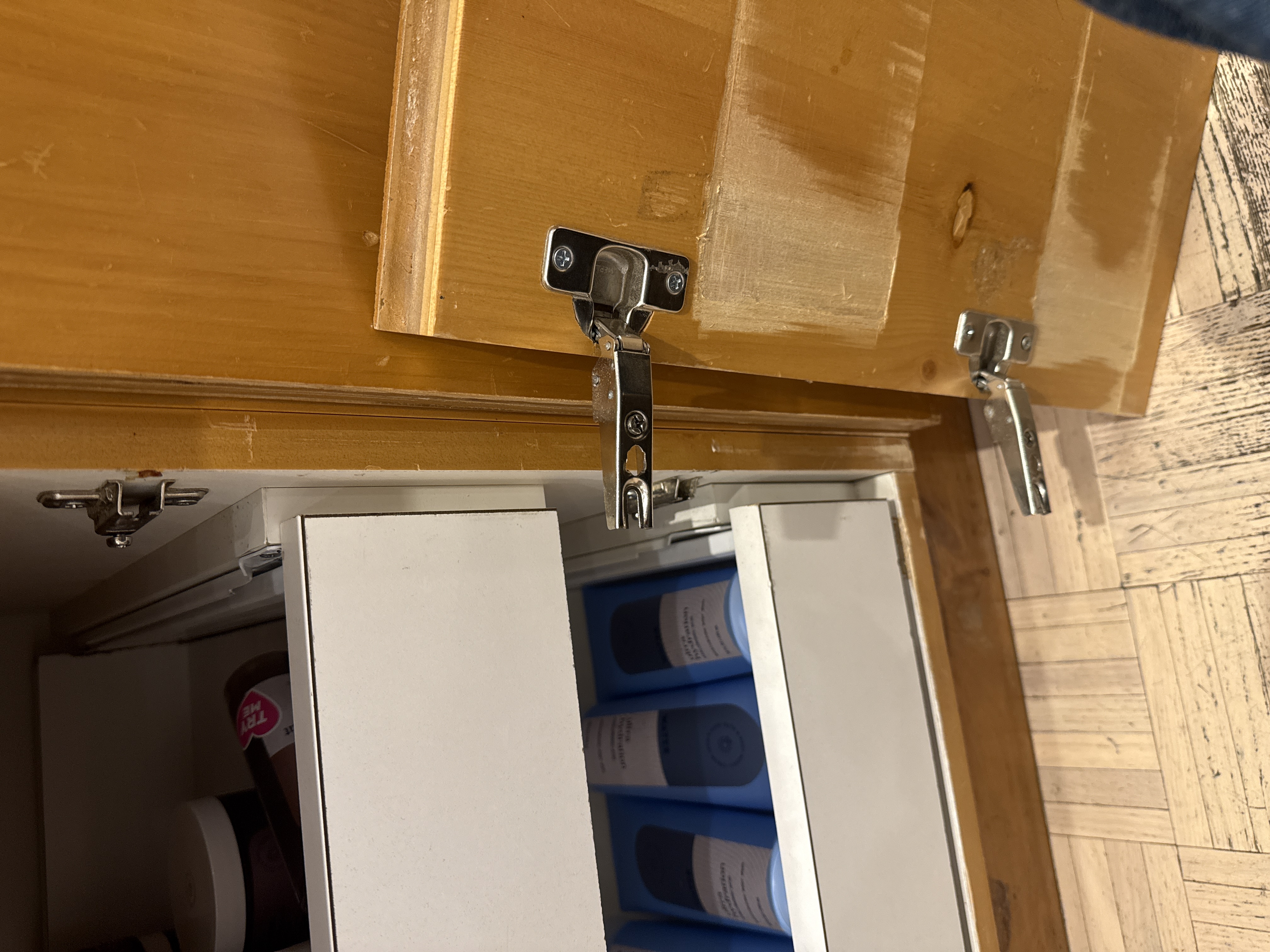 Cabinet hinge repair before — Three Forks Handyman